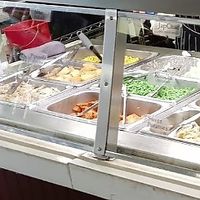 Vegan options on the menu board, and a great selection of sides. at Yong's Kal-Bi in Waimea