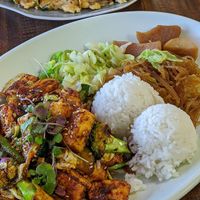 Tofu stir fry with three sides (cabbage, noodles, and potatoes) at Yong's Kal-Bi in Waimea