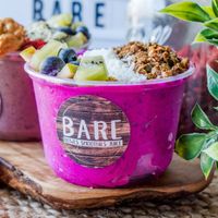 Pretty in pink smoothie bowl and Asana acai smoothie bowl at Bare Blends in Albany