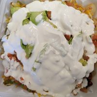 Vegan loaded fries. Surcharge for vegan sour cream, vegan cheese & extra roasted veggies at Ole Ole Burrito Express in Oakland