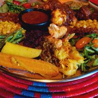 Plate for 2, the upper half isn't all vegan (you can see the egg and there is also some chicken) at Abyssinia in Strasbourg