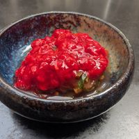 Raspberry covering some kind of salad? at Laska in Lyon