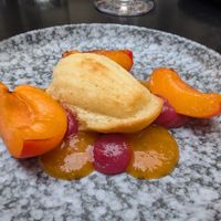 Tasteless madeleine with underripe apricot and fruit puree (yawn again) at Laska in Lyon