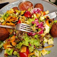 Perhaps the chef made the wrong salad, waitress wrote down vegan salad but came out with halloumi, waitress apologised and took money off at The Garden in Chippenham