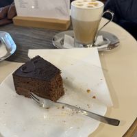 Vegane Sachertorte und Cappuccino mit Sojamilch  at Café Maria Theresia in Merano