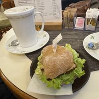 Belegtes Brötchen mit getrockneten Tomaten, Räuchertofu und Salat  at Café Maria Theresia in Merano