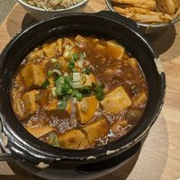 Mapo tofu, brown rice and lotus flower salad. at Pine & Crane in Los Angeles
