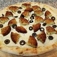 Falafel pizza at Pomodoro in Vientiane