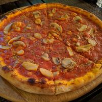 Pizza marinara with added mushrooms at Pomodoro in Vientiane