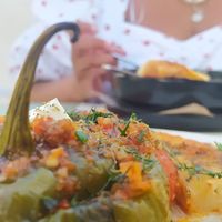 Close-up of half of the gemista (stuffed pepper) at Karma in Santorini