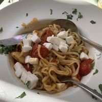 Homemade pasta with local tomatoes and vegan feta  at Karma in Santorini