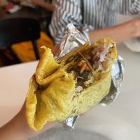 First bite to a yummy vegan burrito :P at Burrito Friends in Malmo