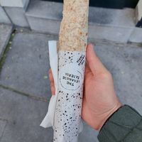 Size of a wrap (average male hand for scale) at The Lebanese Sajeria in Amsterdam