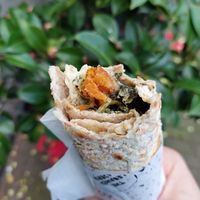 Close up on Spinach & Sweet Potatoes wrap; cranberries give a nice twist to it at The Lebanese Sajeria in Amsterdam