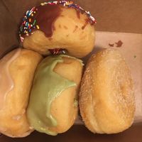 What's left of the half dozen donuts we just picked up. at Vegan Bistro in San Jose