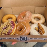 Plain cake, cinnamon sugar, vanilla bean glazed, blueberry, sarsparilla and dill pickle. at Donut Monster in Hamilton