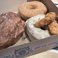 Clockwise from Top Right: Cinnamon Spice, Dill Pickle, Classic Apple Fritter at Donut Monster in Hamilton