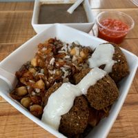 Falafel bowl and mushroom soup. Harissa on the side.  at Koshary Corner in Clarksville
