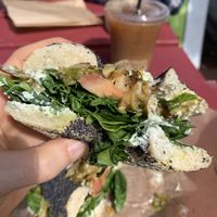 Poppy bagel w/ plain veg cream cheese, spinach, tomato, & grilled brussel sprouts  at Willow's Bagels in Burlington