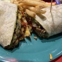 The bomb wrap. In the menu, it said beyond burger, but it was definitely not the texture or smell of the beyond burger, so I asked and it was the impossible burger! It was good  at The Friendly Toast in Burlington