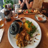 Indian dish and vegan cheese fondue at Gusto-040 in Eindhoven