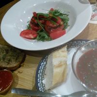 Vegan tapas - stuffed tomatoes, pulled jackfruit sandwich and tomato and fig soup at Gusto-040 in Eindhoven