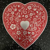 Vegan Silver Embossed Heart - 29 pc (16 oz). Includes includes soft creams, crunchy hazelnut selections, brasero and hazelnut ganaches, marzipan, cordial cherries, & more. at Rose City Chocolatier in Martinsburg