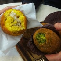 Left: Vegan mushroom arancino. Right: Vegan spinach arancino. at Frittosù in Catania