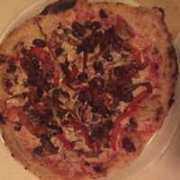 Pizza with vegan cheese, olives, roasted red peppers, black olives, sautéed onions and mushrooms....delicious! at Brigade Pizzeria in Montreal