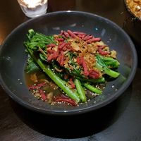 Asian greens topped with fried onions and beetroot at I Like Ramen in Fortitude Valley