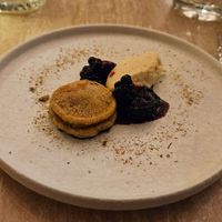 Blackberries with chamomile pancakes and bulgur "cheese" at Bonboon in Amsterdam