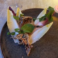 Intermediate

Fried oyster mushroom rolled in nori, fennel seed, and sesame – oyster mushroom puree with roasted yeast – chicory cooked in Marmite butter – watercress –
raw at Bonboon in Amsterdam