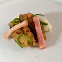 Pre-dessert: Spring onion, rhubarb and apple beignet at Bonboon in Amsterdam