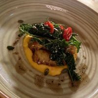 Main course: pumpkin gnocchi with garlic and black cabbage. Small portion, but great taste. Our favourite of the menu. at Bonboon in Amsterdam