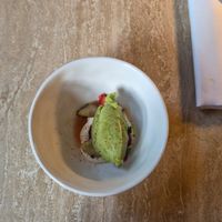 Our pre dessert. A cucumber sorbet with an amazing cream and strawberries. I loved the sweetness of this desert. at Bonboon in Amsterdam