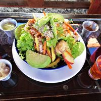 nice big salad bowl with tasty sauces at Namaste Vegan Food in Guatape
