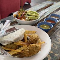Falafel, sauces, salad bar  at Namaste Vegan Food in Guatape