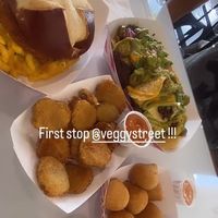 Our chosen spread! Nashville Mac and cheese sandwich, carne asada nachos, fried pickles, jalapeño poppers   at Veggy Street in Henderson