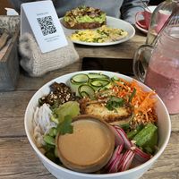 Scrambled eggs in background are not vegan!! But I had a Thai salad and he had an avocado toast (vegan) with eggs (not vegan)  at The Urban Garden in Vilnius