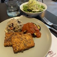 Fried tofu with black bean couscous and a sort of ratatouille type dish, with salad - from the daily menu.  at Vegehop in Zagreb