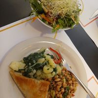 Dish of the day: leek & mushroom pastry, potatoes and chard, bean salad. Super side salad we shared! at Vegehop in Zagreb