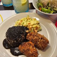 Seitan rolls, potato salad, rice with sesame sauce at Vegehop in Zagreb