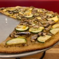 Garden Crisp: thin crispy pizza with squash, zucchini, mushroom. We opted for no cheese but they do have vegan cheese.  at Sauced in Waynesville