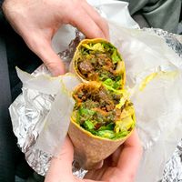 Wrap with sausage, and kale   at Juice & Gems in Hollis