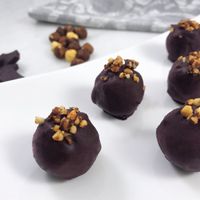 A delicious center of roasted hazelnuts, covered in a decadent dark chocolate shell and topped with caramelized toasted hazelnuts. These delectable truffles are a delight you must try.

If you are looking for a treat that helps you stay in shape and operating at your best, then look no further because these treats are completely raw, vegan, paleo, keto, non-gmo, gluten-free and sugar-free... just simply good for you!
 at Heidis Feel Good Foods in Clearwater