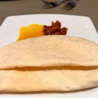 A Couple of Poppadoms with Mango Dressing and Lime Pickle  at Little India in Kista