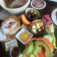 Pancakes breakfast with spreads, veggies and fruits. It also comes with a bread of choice (I took the walnut bread).  at Cafe Einstein in Ulm