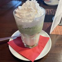 Matcha Latte with coconut cream  at Cafe Einstein in Ulm