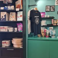 Merch they sell inside including vegan food for cats at Crazy Cat Café in Milan
