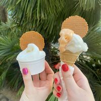 Cup of lemon sorbet and a mango and lemon sorbet cone   at Gelateria Pescara La Fonte in Pescara